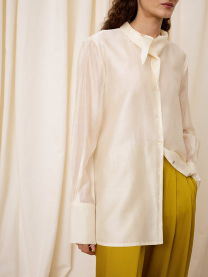 Blusa marfil con abertura trasera