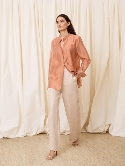 Blusa rosa con abertura trasera