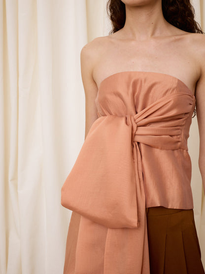 Top rosa con lazo