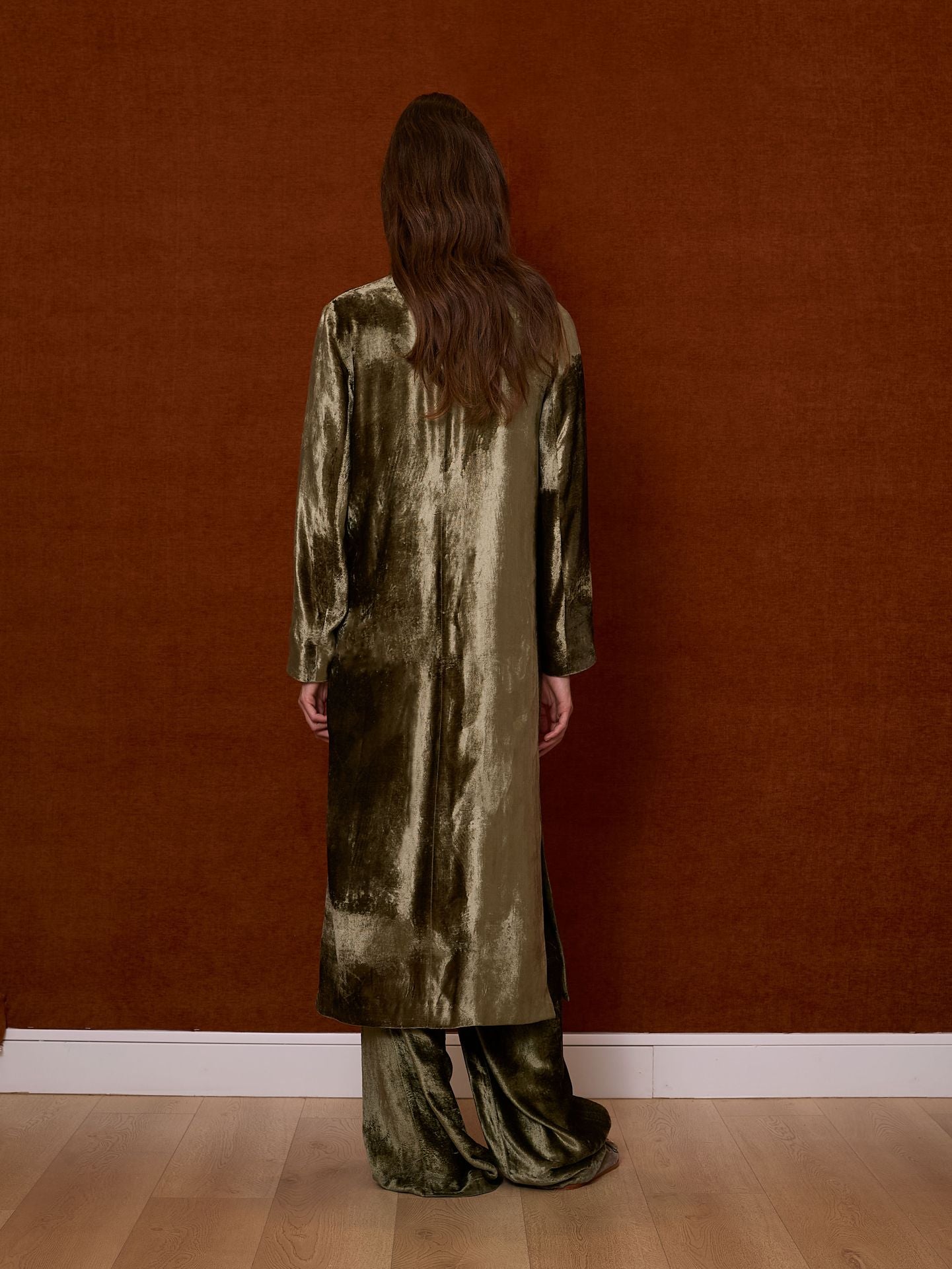 Abrigo verde de terciopelo y lentejuelas