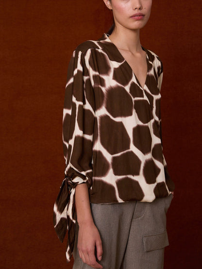 Blusa cruzada animal print