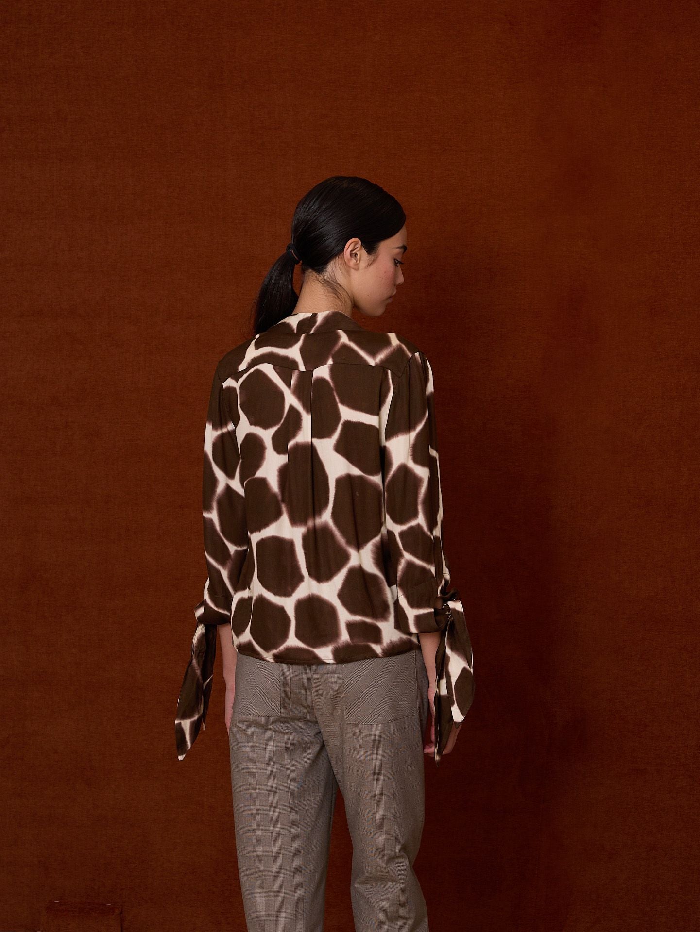 Blusa cruzada animal print