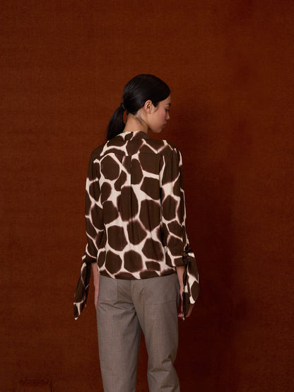 Blusa cruzada animal print