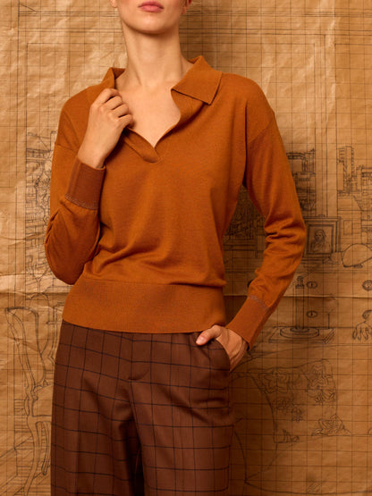 Polo de punto color naranja