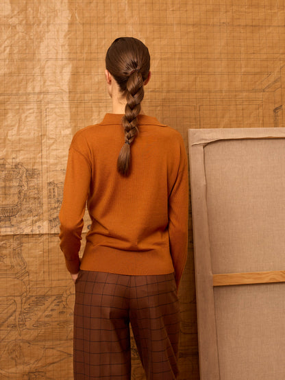 Polo de punto color naranja