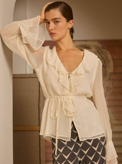 Blusa marfil volantes