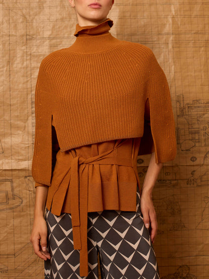 Poncho canalé naranja