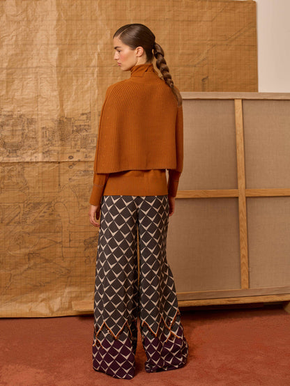 Poncho canalé naranja