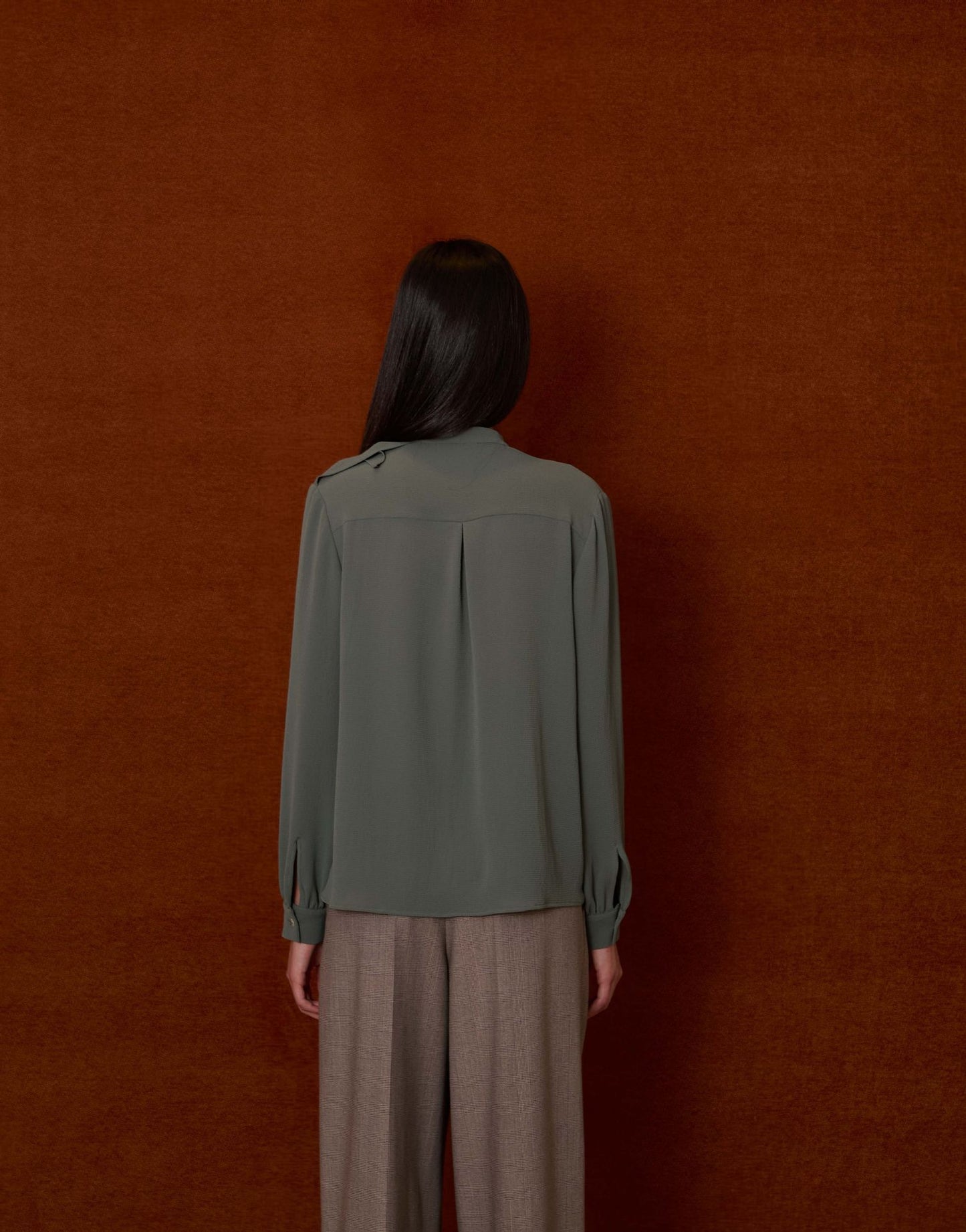 Blusa con lazada cruzada verde