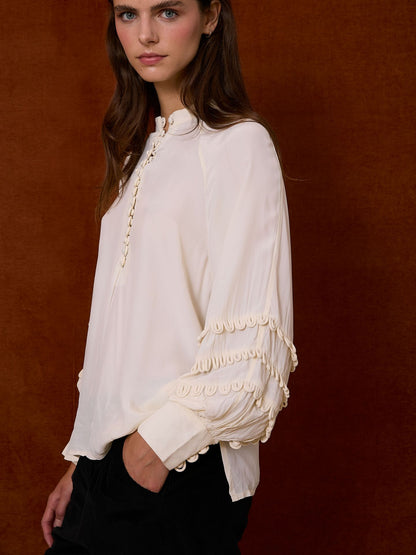 Camisa satinada manga ranglan marfil