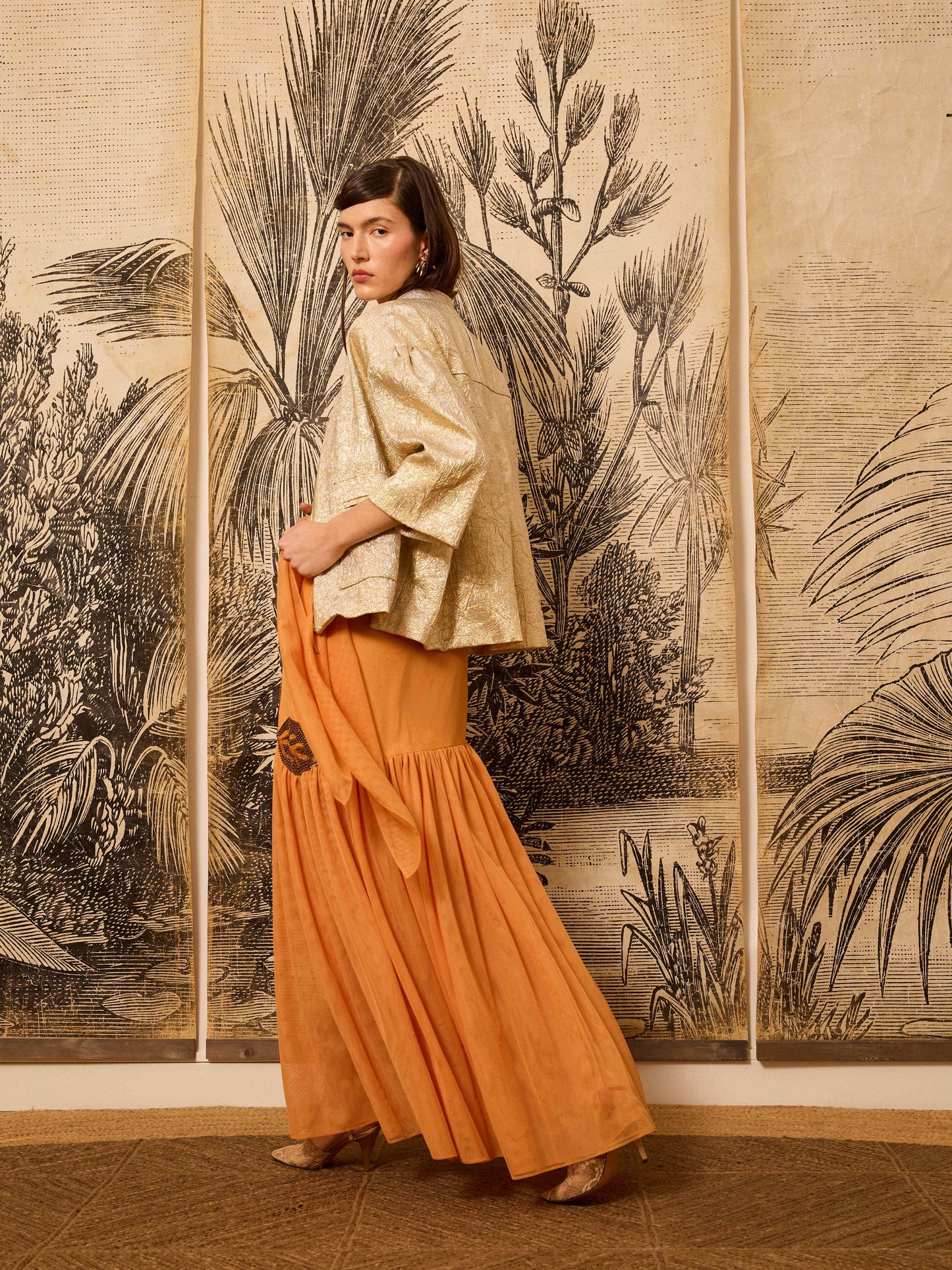 Cazadora metalizada dorada