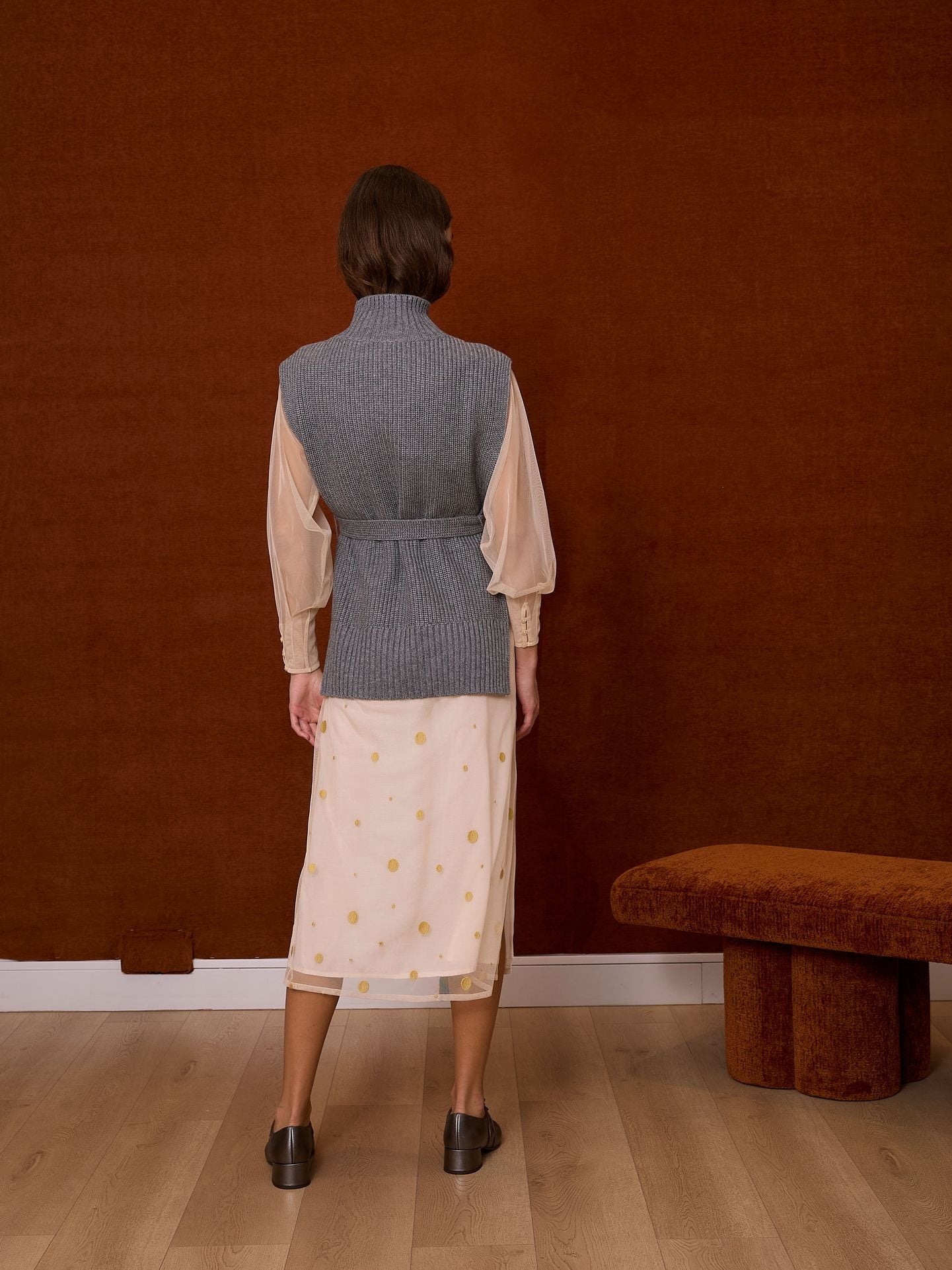 Chaleco cuello alto gris