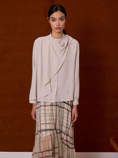 Blusa con lazada cruzada gris