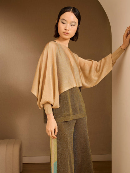 Poncho de lurex dorado