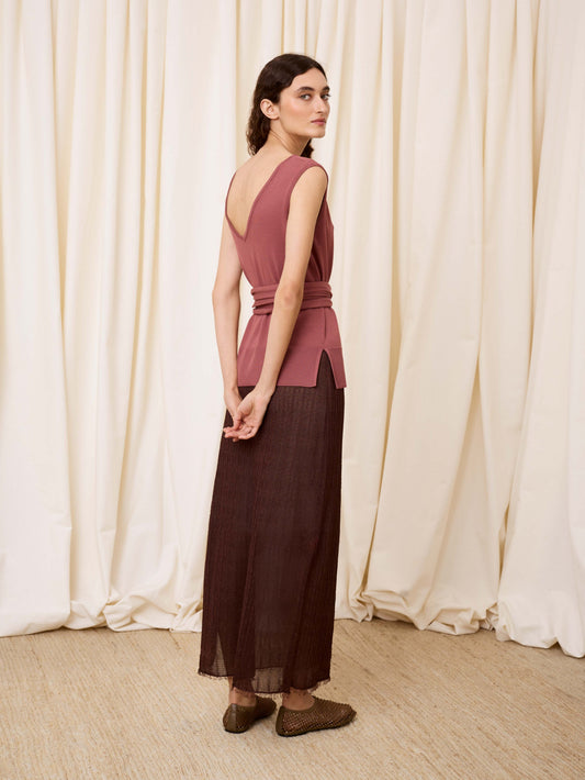 Top de punto con lazo ciruela