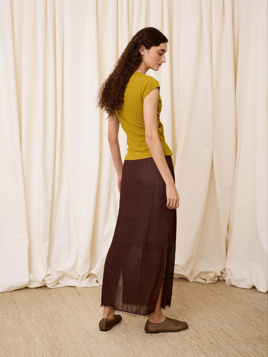 Top de punto con frunce pistacho