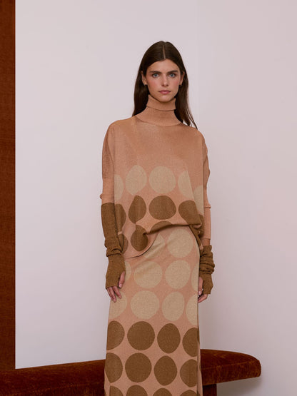 Jersey cuello alto rosa con lunares