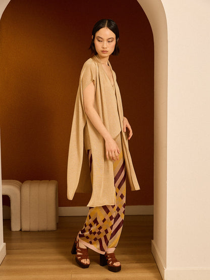 Chaqueta dorada de lurex larga