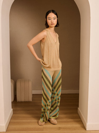 Jersey pico dorado de lurex