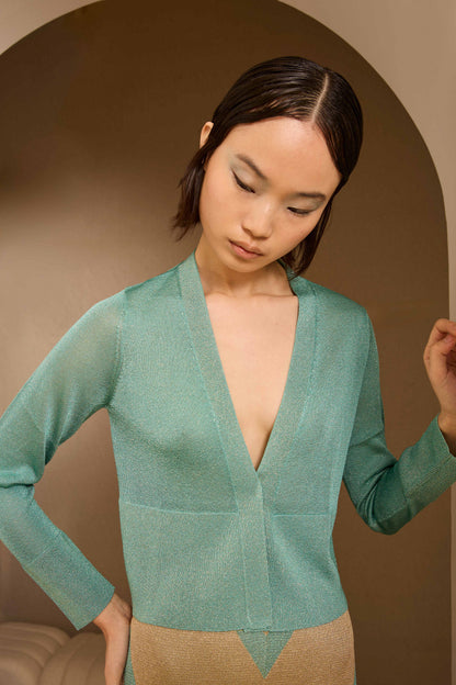 Chaqueta corta de lurex turquesa