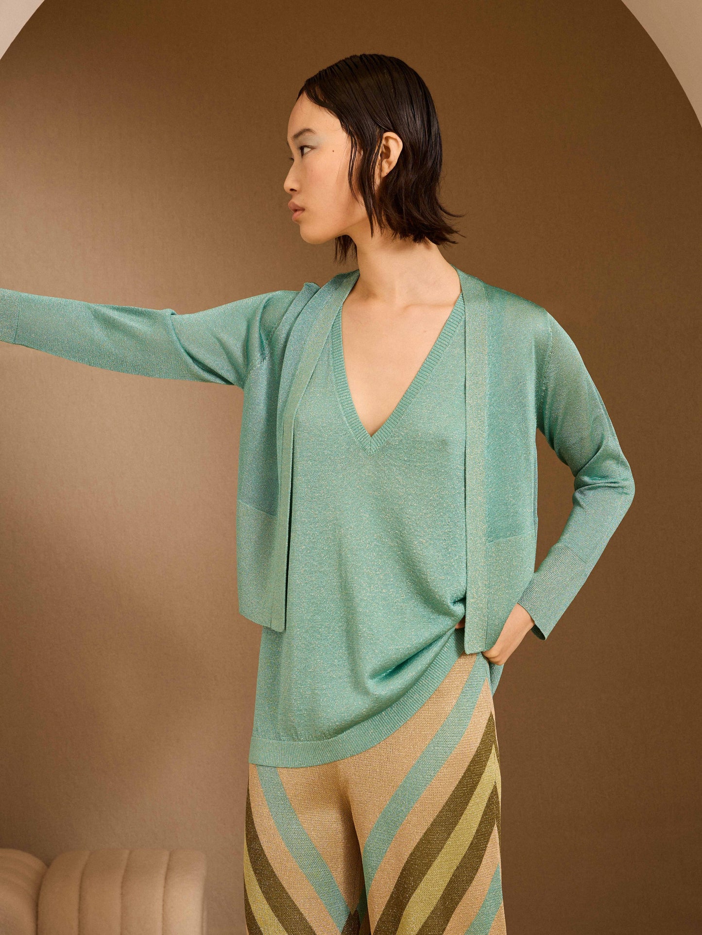 Chaqueta corta de lurex turquesa