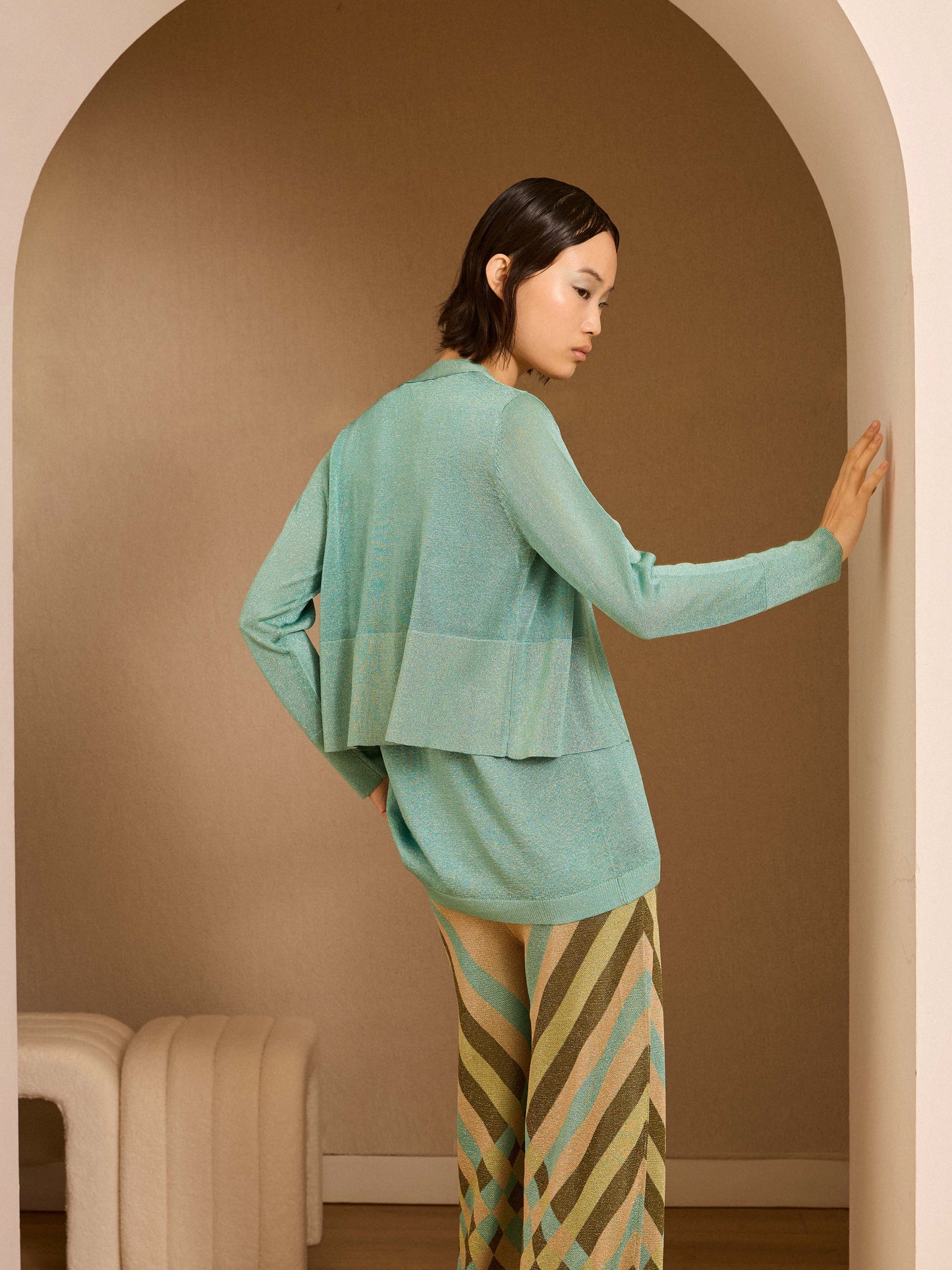 Chaqueta corta de lurex turquesa