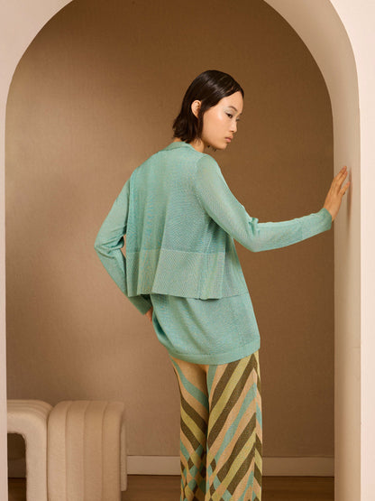 Chaqueta corta de lurex turquesa