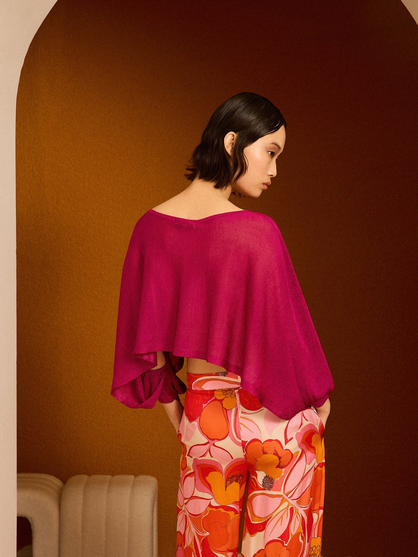 Poncho fucsia de lurex