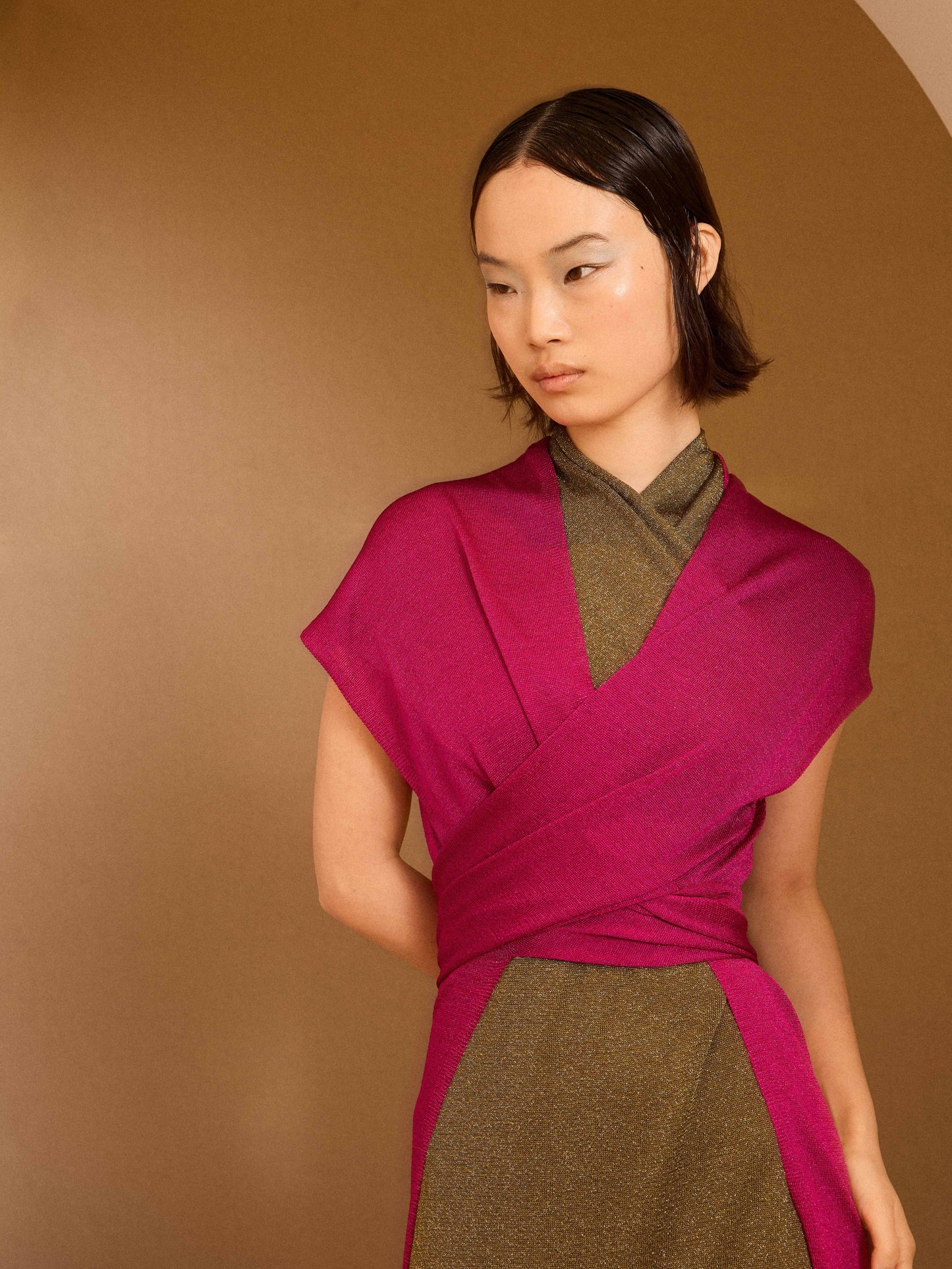 Chaqueta larga de lurex fucisa