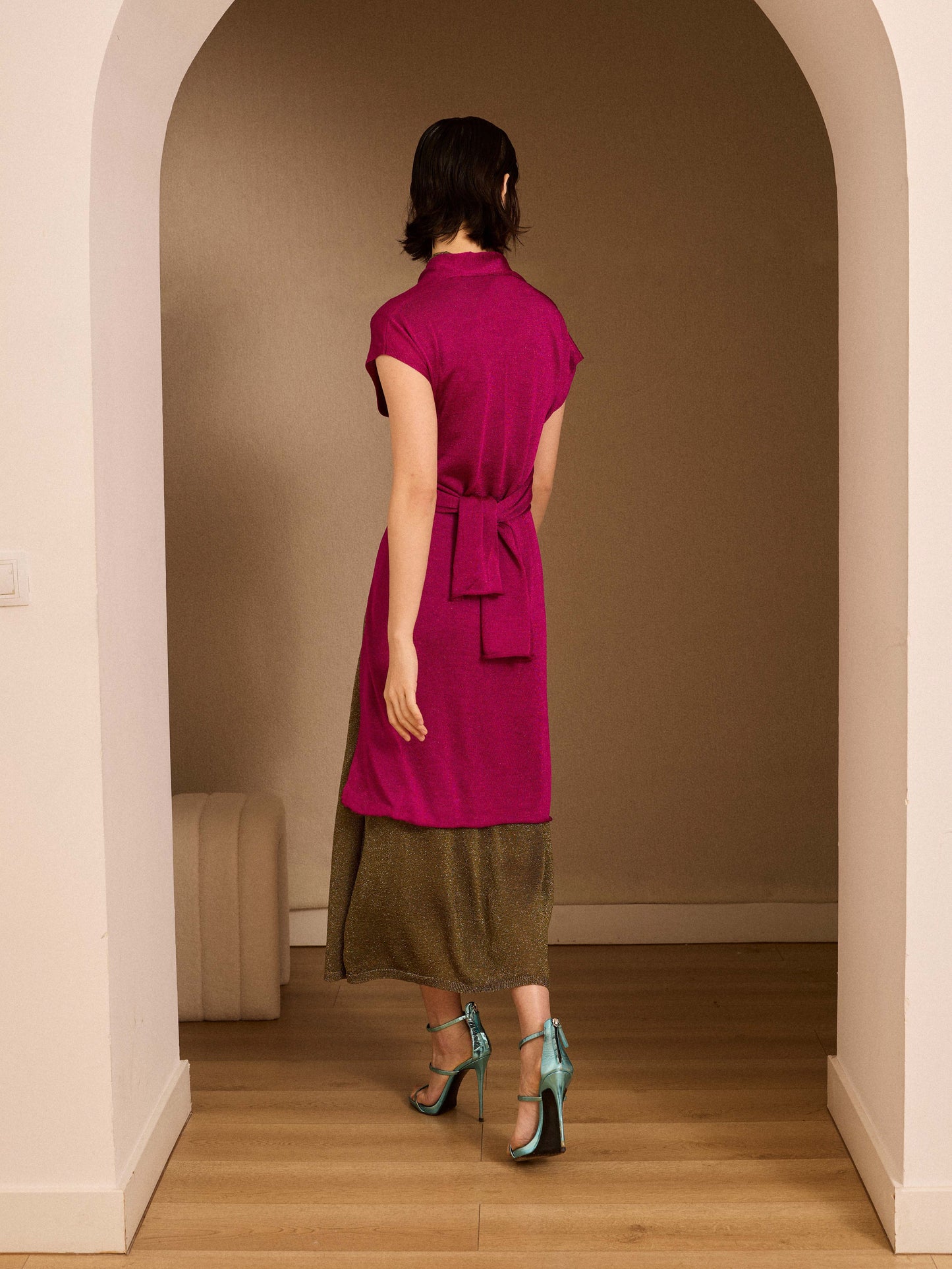 Chaqueta larga de lurex fucisa