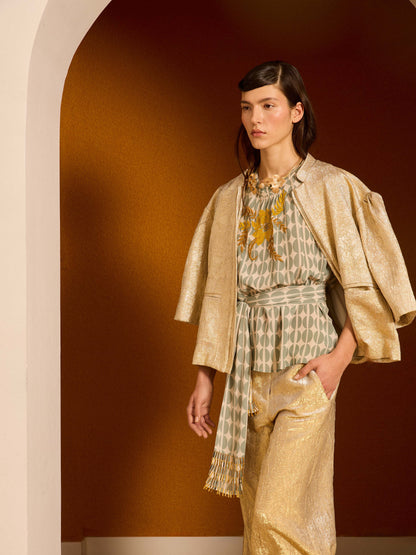 Cazadora metalizada dorada