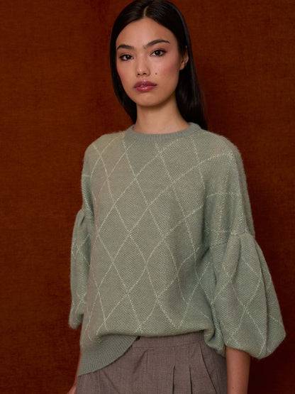 Jersey verde agua con rombos de lurex y mangas farol