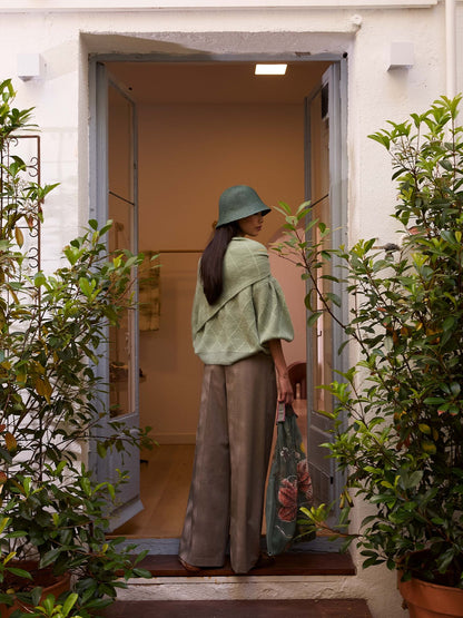 Jersey verde agua con rombos de lurex y mangas farol