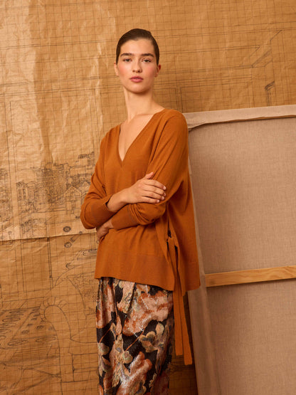 Jersey naranja de pico con lazadas