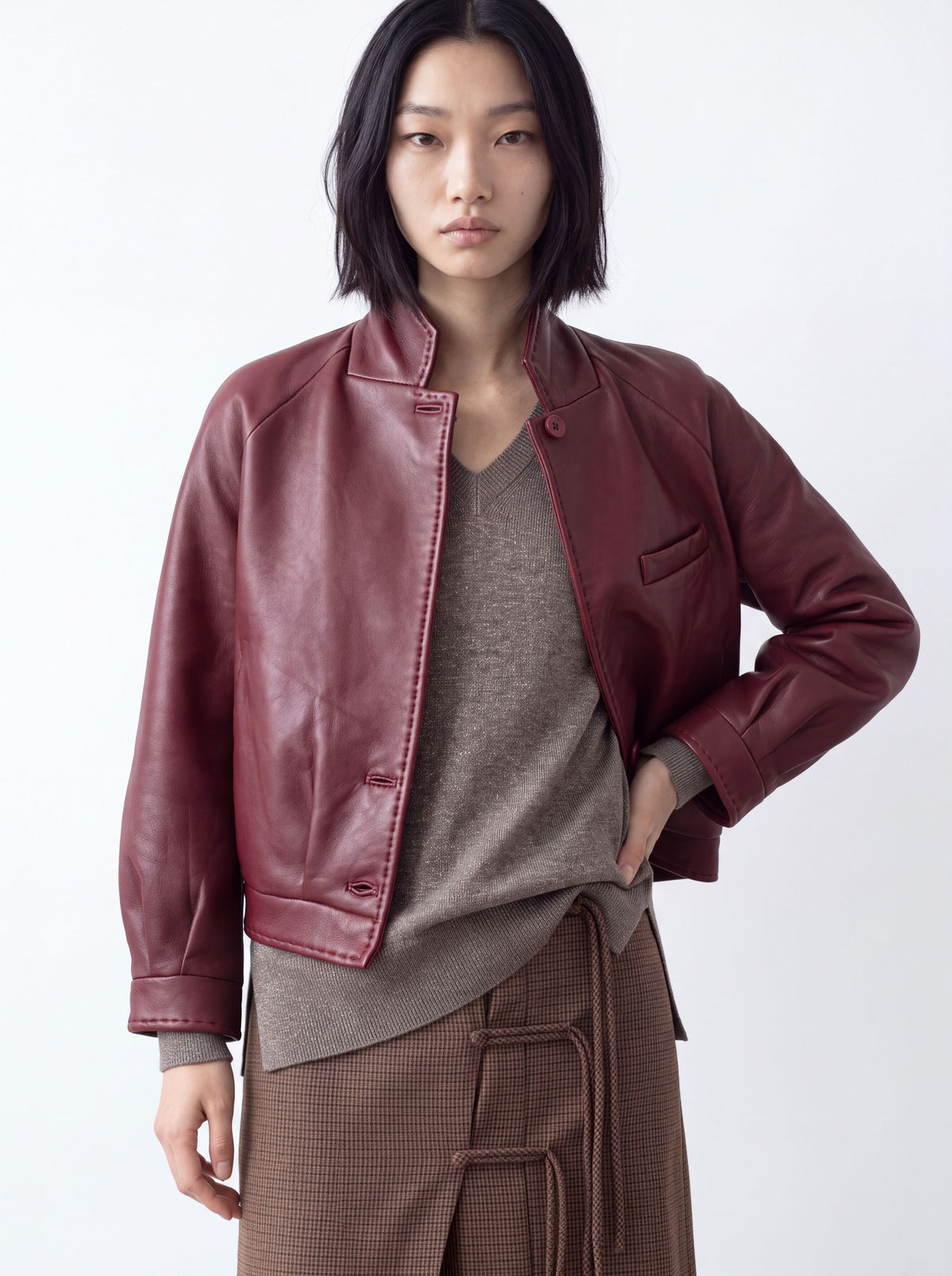 Cazadora bomber de piel vino