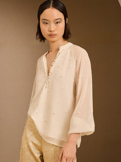 Blusa con apliques marfil